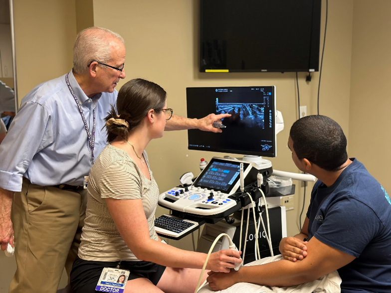 Rheumatologists giving an ultrasound 
